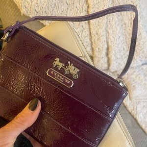 Shiny purple Coach wristlet